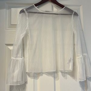 White sheer Babaton blouse with wide sleeves
